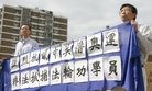 Published on 3/22/2008 法轮功,休士顿学员中领馆前抗议中共借奥运加剧迫害（图）