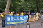 Published on 6/26/2009 中共外长参加联合国会议　法轮功学员谴责迫害（图）