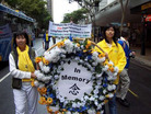 Published on 7/24/2006 澳洲昆士兰法轮功学员市中心游行传真相（图）