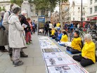 Published on 10/12/2015 法轮功,伦敦游行震撼人心　更多华人明真相 【明慧网】
