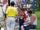 Published on 7/6/2003 休士顿大法弟子参加汉特威市国庆游行（图）

