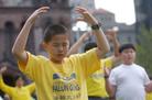 Published on 7/26/2004 千人波士顿盛大游行　吁反迫害　要求公审江（图）
