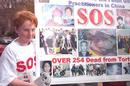 Published on 7/21/2001 “7.20”两周年 墨尔本弟子举行SOS步行活动
