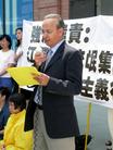纽约法轮功学员强烈谴责江氏集团海外雇凶杀人（图）
