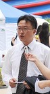 法轮大法明慧网 - 两在韩法轮功学员面临遣返　各界关注（图）