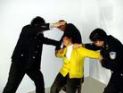 Published on 2/17/2005 		黑龙江省依兰县恶警酷刑折磨法轮功学员演示（图）
