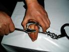 Published on 2/17/2005 		黑龙江省依兰县恶警酷刑折磨法轮功学员演示（图）
