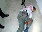 Published on 3/19/2005 		黑龙江省方正县拘留所迫害大法弟子酷刑演示（图）

