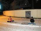 法轮功学员在慕尼黑中领馆前雪夜悼念同修刘成军, 呼吁惩办杀人凶手 2003-12-31