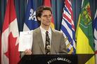 中国驻多伦多领事潘新春诽谤法轮功学员，被法庭判罪，法轮功学员在加拿大国会召开新闻发布会 2004-02-05 