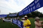 法轮功学员于“七•二零”在华府集会呼吁解体中共结束迫害图为国会山庄前集会现场2007-7-19