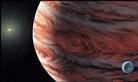 天文学家发现了一个规模和太阳系相近的行星系--新发现的行星的质量是木星的3.5到5倍。