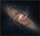 NASA照片，图中显示的是独特的星系对NGC 3314