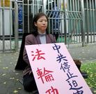 Published on 11/12/2005 ��ɽAPECǰϦ����Ů����Ϊ���ֹ���Ը��ͼ��